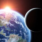 Föld és egy exobolygó látványa a Nap felkeltével.