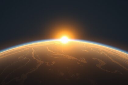 Napkeltében a Föld felszíne és az égbolt színjátéka